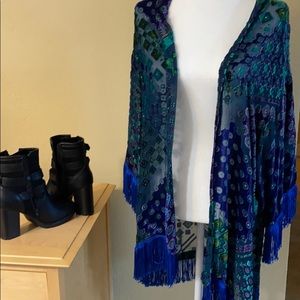 Multi colored vintage vest with fringe